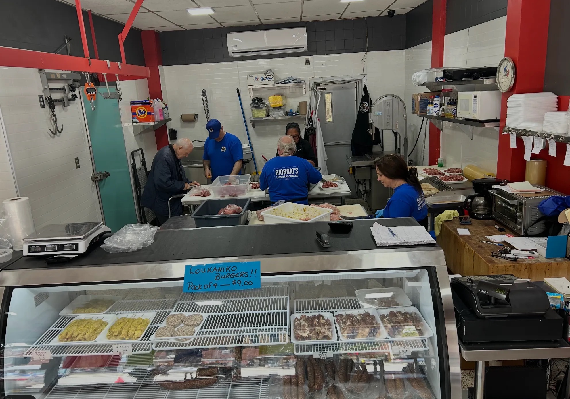 The Giorgio's team at work behind the counter